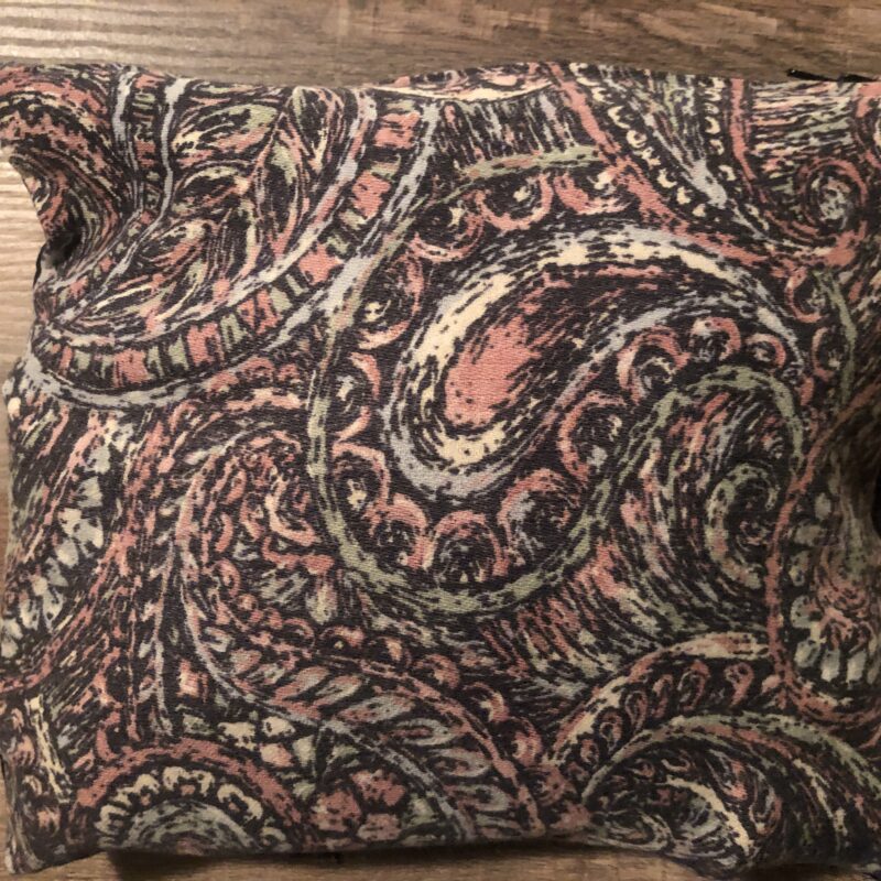 A thumbnail of a small, multicoloured pillow.